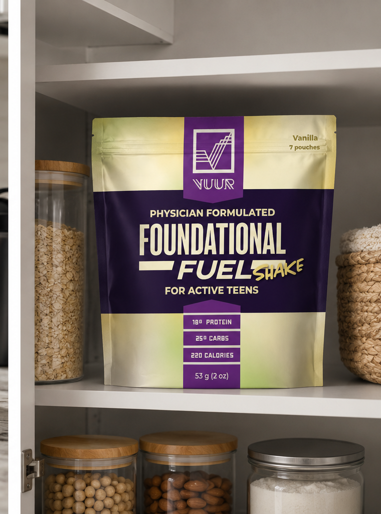 VUUR Foundational Fuel physician-formulated vanilla shake mix package for active teens displayed on a kitchen pantry shelf.